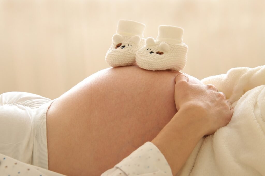 pregnant, maternity, mother, motherhood, expecting, pregnant woman, woman, pregnancy, belly, happy mothers day, baby bump, baby, baby shoes, mom, family, love, parenting, baby socks, parenthood, mum